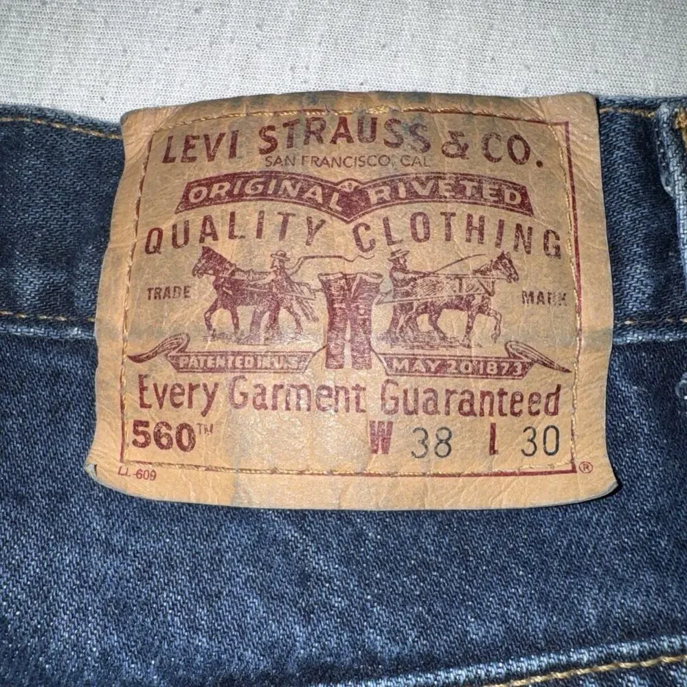 Vtg 90s Levi's 560 Loose Fit Tapered Leg Jeans Men 38x30 Blue Made in USA EUC